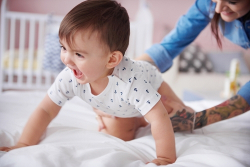 Sweet baby boy start crawling