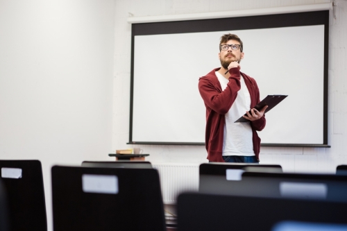 Young teacher preparing for the lecture